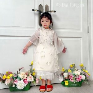 Áo Dài Màu Trắng Dính Nơ Cho Bé Diện Tết